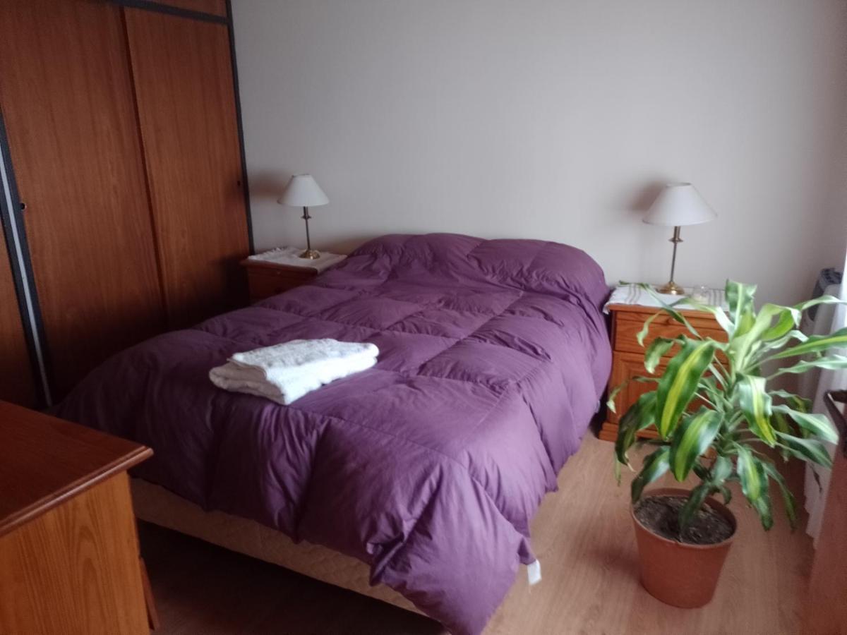 El Patio Del Aromo Apartman Puerto Madryn Szoba fotó